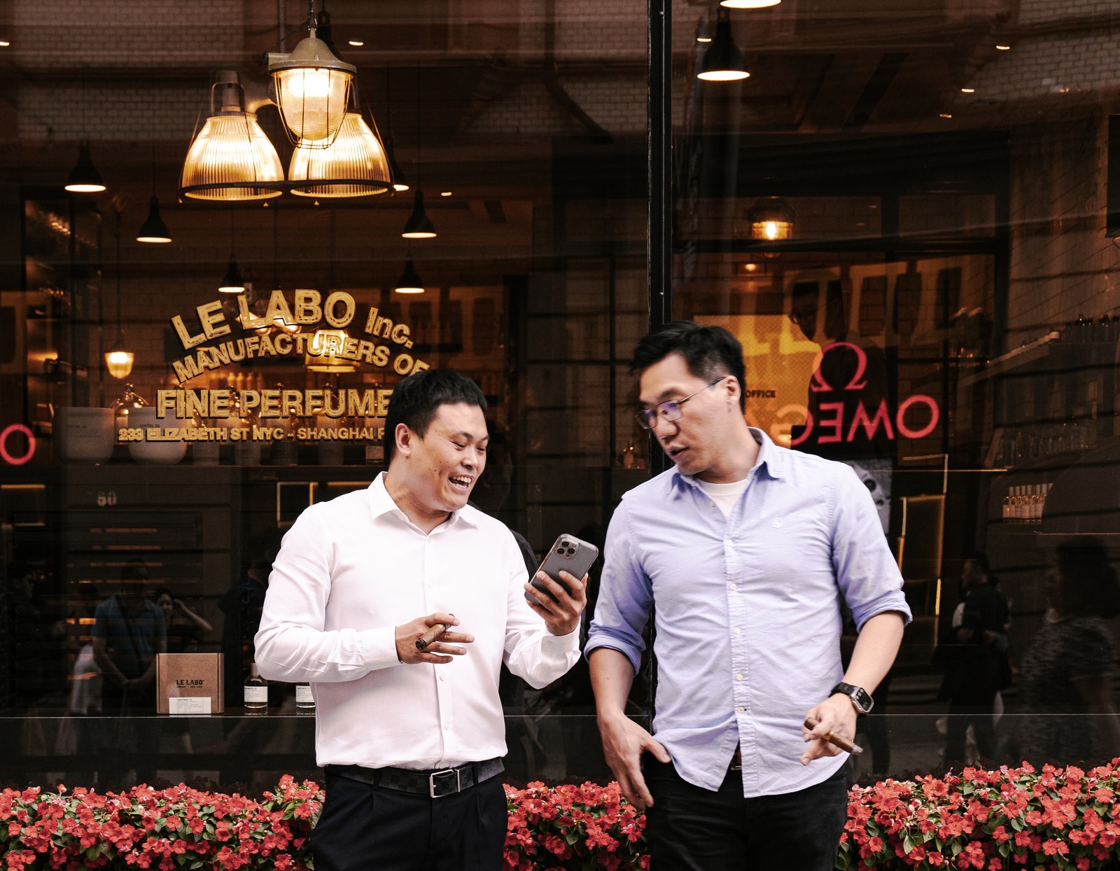A pair outside a cafe.
